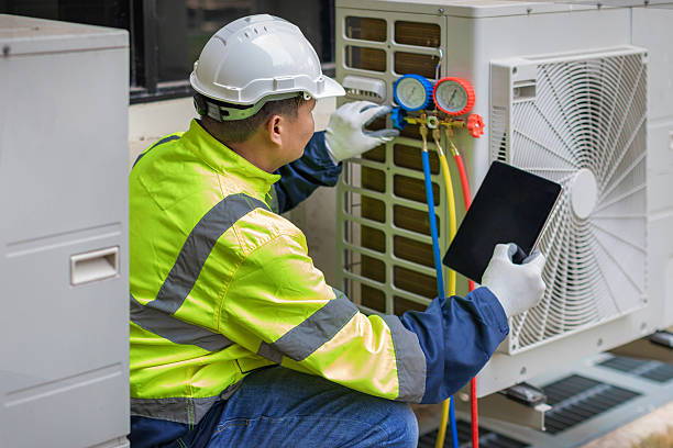 Professional Hvac technician working in Towson, MD